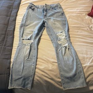 Gently used Good American raw hem jeans
